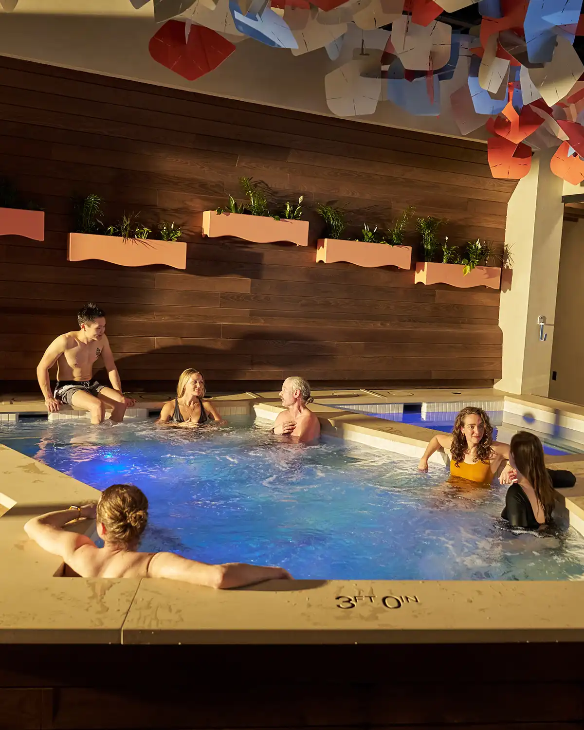Guests soaking together in the Social Lounge at Flux Thermal Lounge