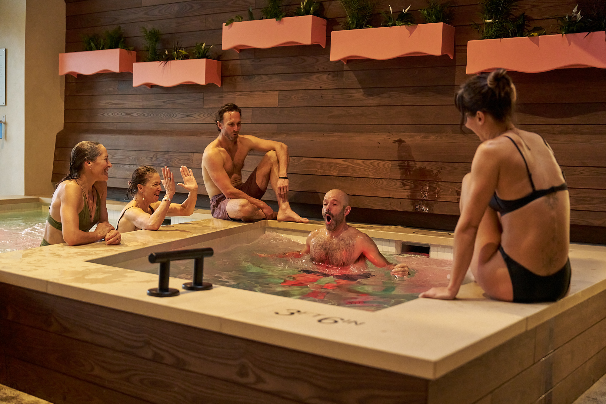 Friends soaking together at Flux Thermal Lounge
